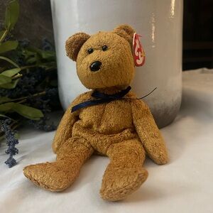 Fuzzy TY beanie baby new condition with errors